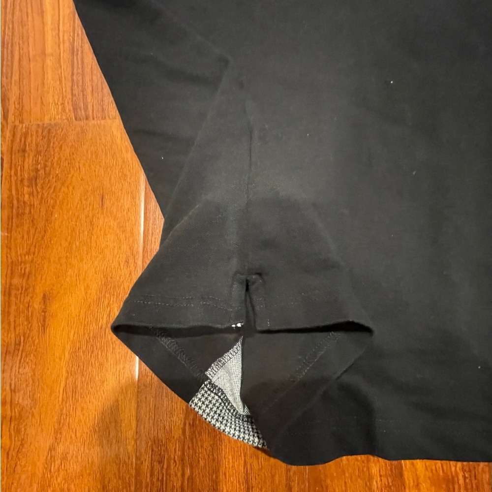 Stylish Black Polo Shirt with White Accents - Picture 5 of 10